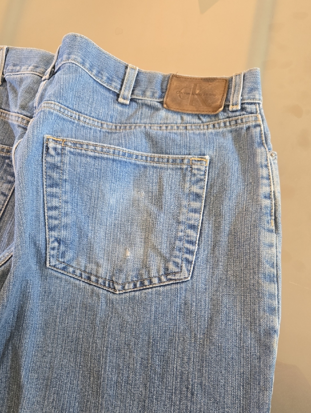 Calvin Klein Jeans Light Blue Denim with Brown Leather Patch